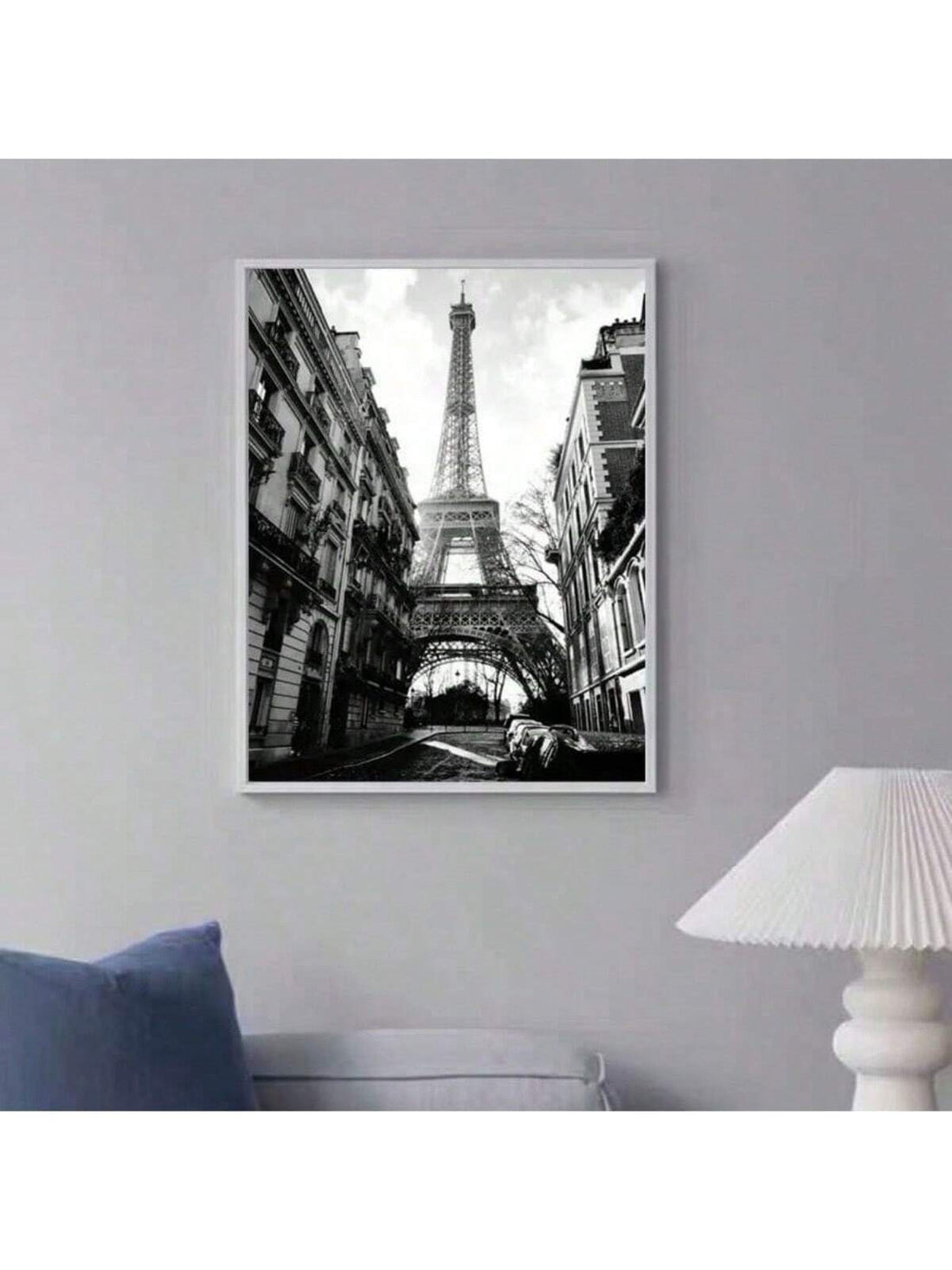 Add a touch of Parisian charm to your space with this Elegant Unframed Paris Fashion Tower Canvas Print. Featuring a vintage black and white illustration of a stylish girl alongside the iconic tower, it’s perfect for bringing chic sophistication and playful flair to your living room décor. This timeless piece blends fashion and art effortlessly, making every glance a little more fabulous.