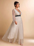 Make a statement at your next soirée in this stunning V-neck A-line dress that effortlessly blends sophistication with fun. The delicate mesh polka dot design adds a flirty touch while the flattering silhouette ensures you'll feel confident and gorgeous. Perfect for banquets, cocktail parties, and special celebrations, this dress transitions beautifully from elegant to playful. Slip it on and let the compliments roll in!