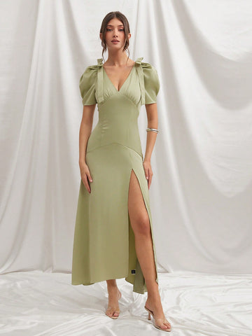 Step into effortless charm with this Elegant V-Neck Maxi Dress! Its playful shoulder tie detail and flirty short sleeves add a dash of fun to your look, while the flattering V-neckline keeps it classy. Perfect for twirling through sunny days or stealing the spotlight at your next soirée!