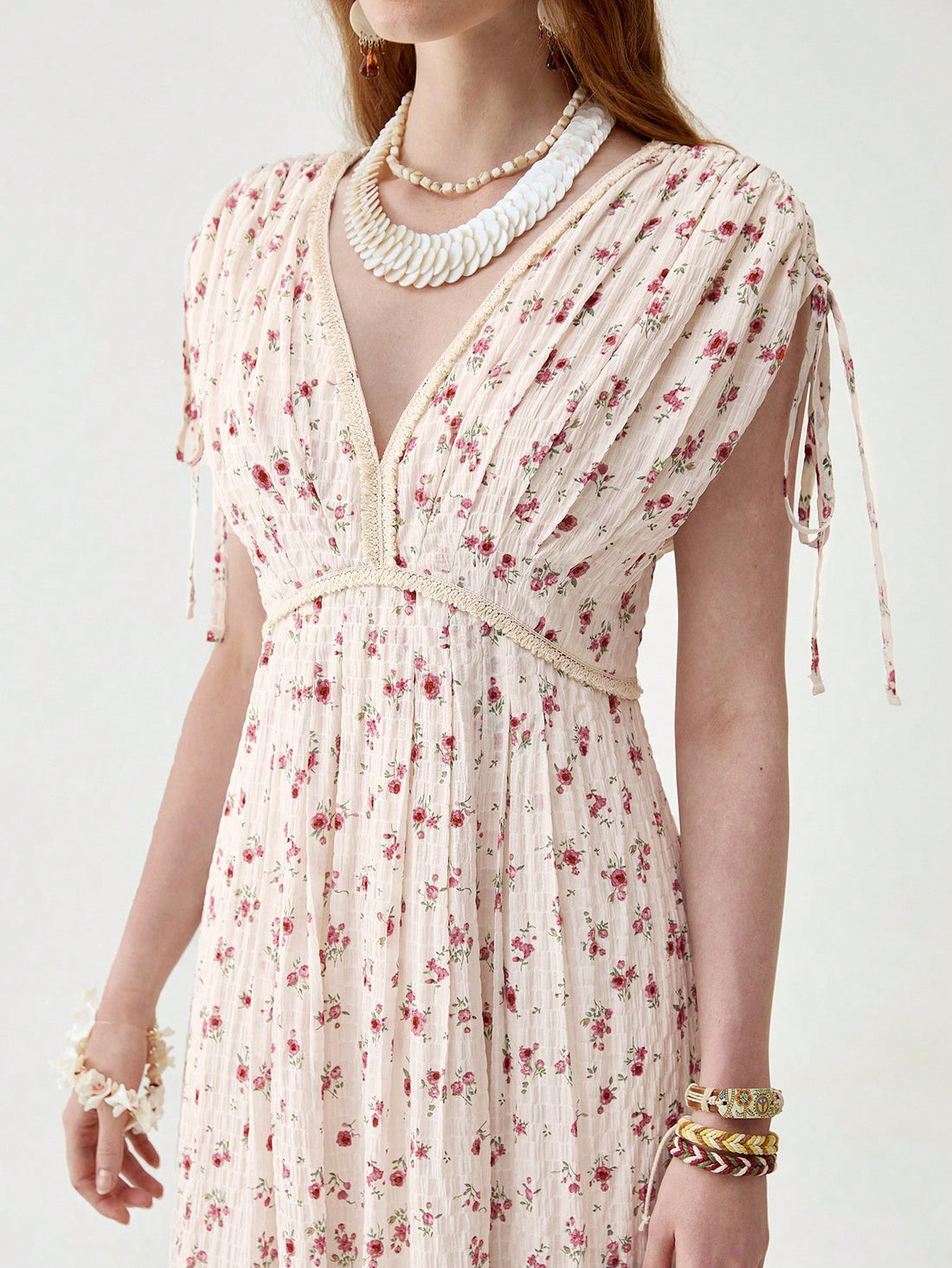 Float through spring and summer in this playful V-neck boho dress! The pleated design adds a flirty bounce to your step, while the drawstring lets you customize your fit for all-day comfort. Perfect for beach days, festival adventures, or simply turning heads on a casual stroll. This long dress brings effortless elegance to your warm-weather wardrobe!