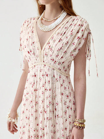 Float through spring and summer in this playful V-neck boho dress! The pleated design adds a flirty bounce to your step, while the drawstring lets you customize your fit for all-day comfort. Perfect for beach days, festival adventures, or simply turning heads on a casual stroll. This long dress brings effortless elegance to your warm-weather wardrobe!