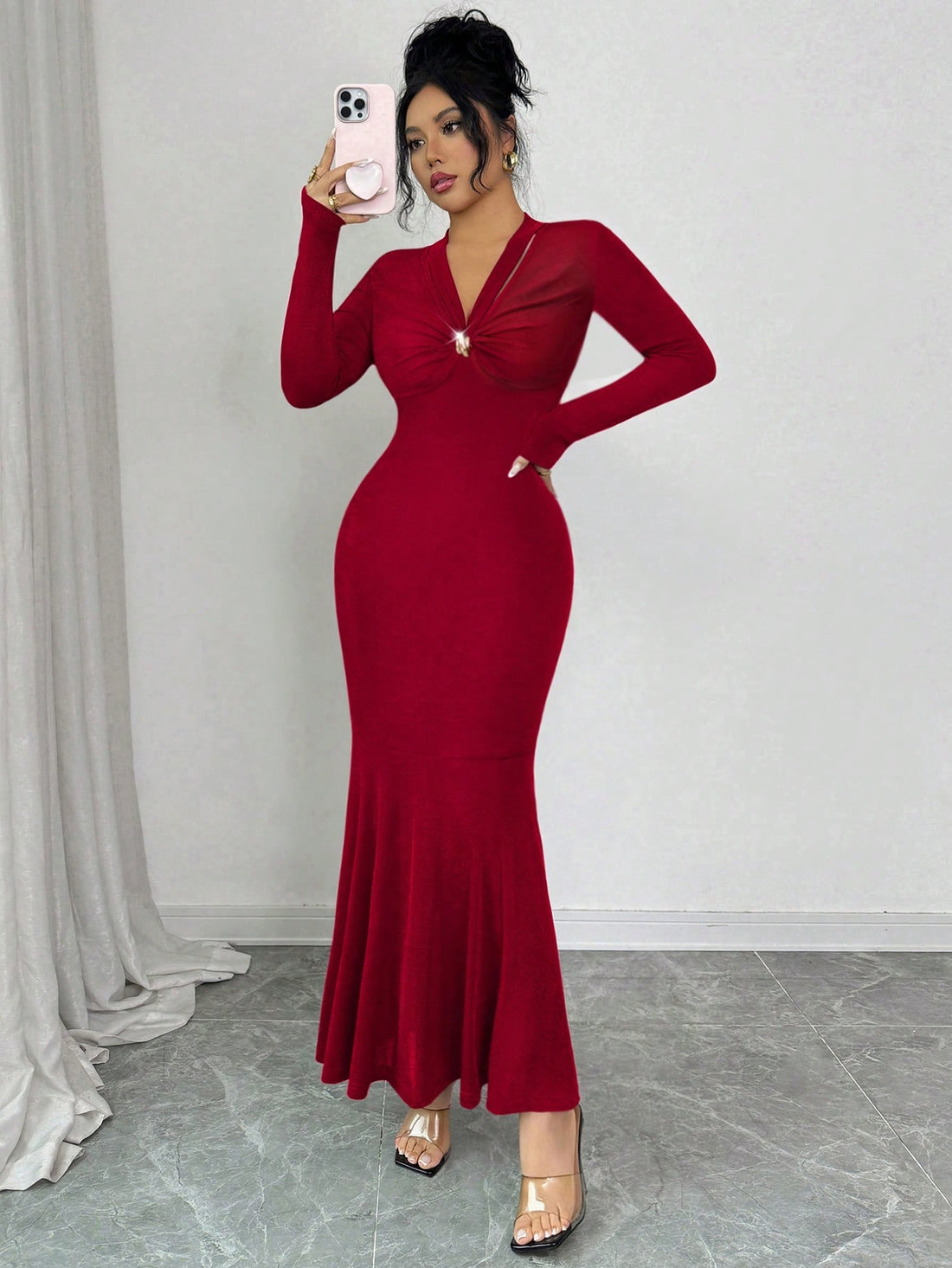 Turn heads this season in our stunning V-neck mermaid dress, where elegance meets playful sophistication. The ruched long sleeves add dimension and flattering texture, while the classic mermaid silhouette hugs your curves in all the right ways. Perfect for holiday parties, winter galas, or any fall occasion that calls for a show-stopping look. This dress transforms you into the most glamorous version of yourself—because sometimes you need to feel absolutely fabulous!