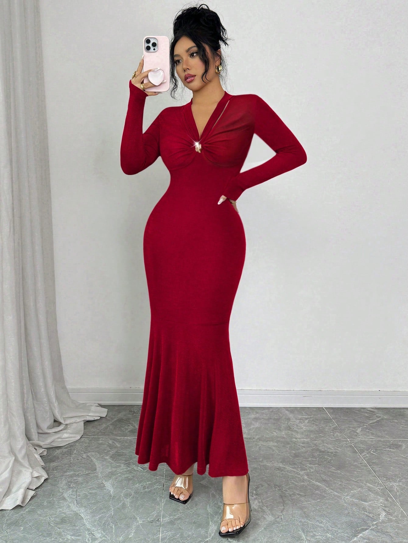 Turn heads this season in our stunning V-neck mermaid dress, where elegance meets playful sophistication. The ruched long sleeves add dimension and flattering texture, while the classic mermaid silhouette hugs your curves in all the right ways. Perfect for holiday parties, winter galas, or any fall occasion that calls for a show-stopping look. This dress transforms you into the most glamorous version of yourself—because sometimes you need to feel absolutely fabulous!