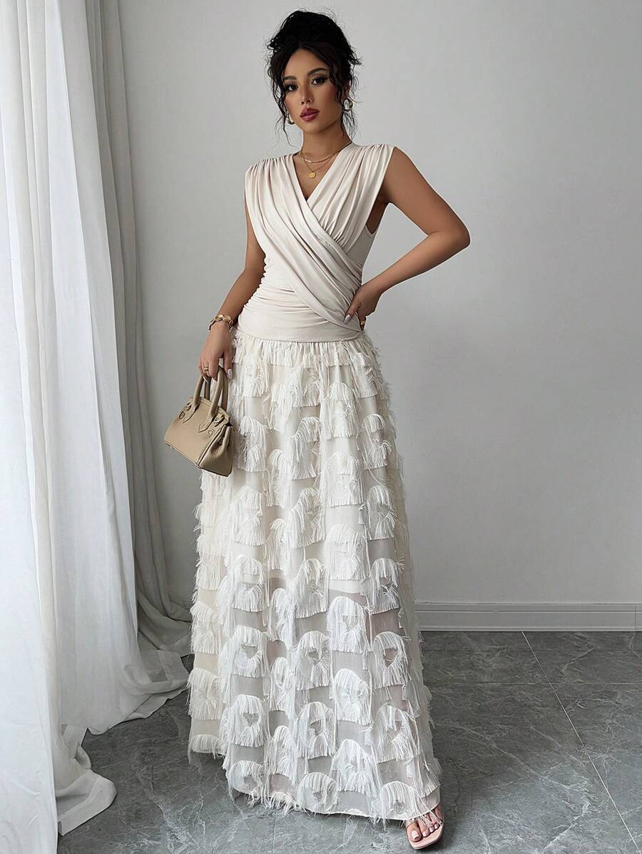 Step into summer with this playful yet elegant V-neck dress, featuring flattering ruching that enhances your silhouette. Designed for effortless resort chic, it’s your go-to for sunny days and breezy evenings, combining comfort and style in one fun package. Perfect for sipping cocktails by the pool or dancing under the stars.