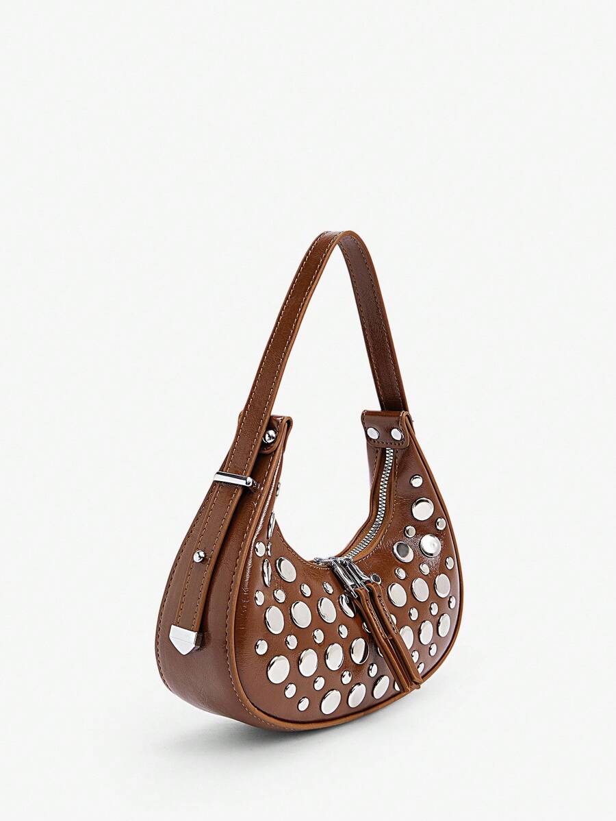 Meet your new favorite sidekick: the Elegant Versatile Hobo Bag for Women! With its chic top handle and edgy rivet details, this bag effortlessly brightens up your daily commute, office hours, or casual strolls. Spacious yet stylish, it’s the perfect companion that carries all your essentials while turning heads wherever you go. Ready for work, play, and everything in between!