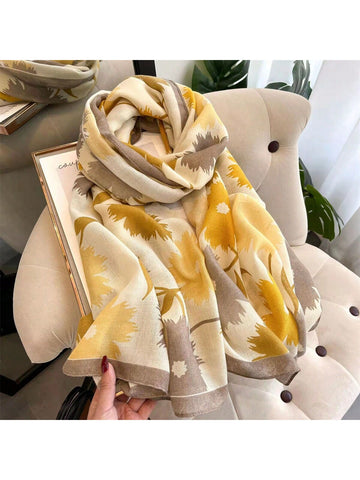 Add a touch of elegance to your outfit with our Versatile Scarf for Women. Made from thin gauze, it's perfect for spring and summer. The large flower design adds a unique twist to this must-have accessory. Versatility, comfort, and style - all in one scarf. Elevate your look today.