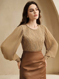 Ring in the new year with timeless elegance! This vintage-inspired knit blouse features charming lantern sleeves that add a touch of whimsy to your wardrobe. Crafted from soft, comfortable knit fabric, it's perfect for holiday gatherings, festive celebrations, or elevating your everyday style. The classic silhouette pairs effortlessly with jeans or skirts, making it a versatile piece you'll reach for again and again. Celebrate in style with this delightfully chic essential.