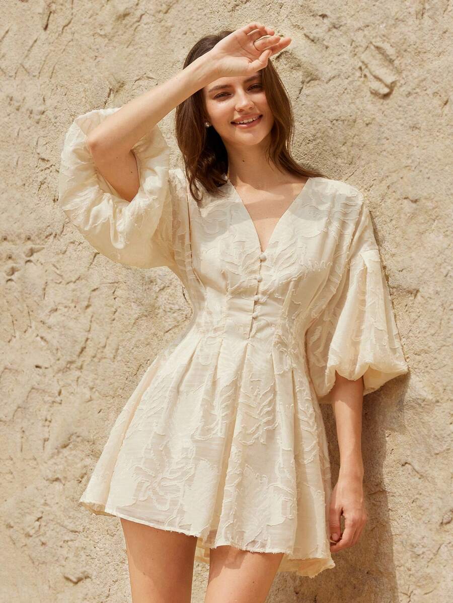 Step into summer with timeless charm in this enchanting floral dress. Delicate 3D embroidery brings botanical blooms to life across the fabric, while romantic puff sleeves add a whimsical touch that's utterly Instagram-worthy. The flattering short silhouette keeps things breezy and fun, perfect for garden parties, brunch dates, or whenever you want to feel like the main character. Vintage-inspired details meet modern comfort—because looking fabulous shouldn't mean sacrificing ease. A wardrobe essential that