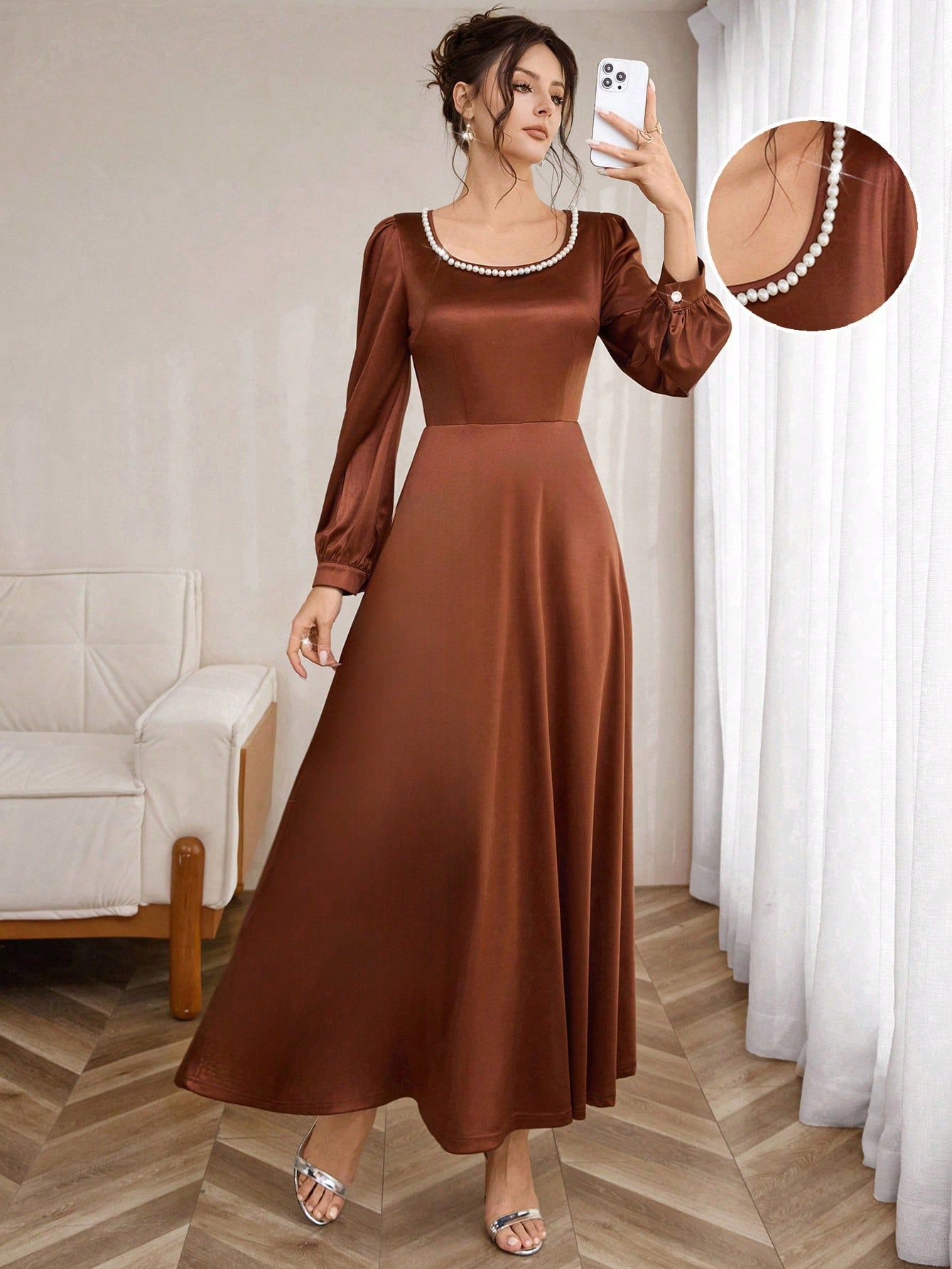 Step into timeless elegance with this stunning A-line satin dress, where vintage charm meets modern sophistication. The delicate studded pearl embellishments add a touch of glamour, while the charming lantern sleeves create a flattering, romantic silhouette. Perfect for fall gatherings and spring celebrations, this dress transitions effortlessly from day to night. The flowing satin fabric drapes beautifully, ensuring you'll feel as fabulous as you look. Whether you're heading to a special occasion or turnin