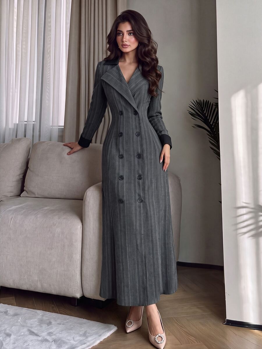 Full front view of grey pinstripe maxi dress with double-breasted lapels and black cuffs
