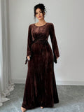 Step into sophistication with this stunning coffee velvet midi dress that effortlessly blends vintage charm with modern flair. The luxuriously soft velvet fabric drapes beautifully while the asymmetrical flare sleeves add an unexpected twist of elegance and movement. Perfect for autumn and winter gatherings, this dress transitions seamlessly from casual brunches to evening events. The rich coffee tone flatters all skin tones and pairs beautifully with your favorite boots or heels. Timeless, versatile, and u