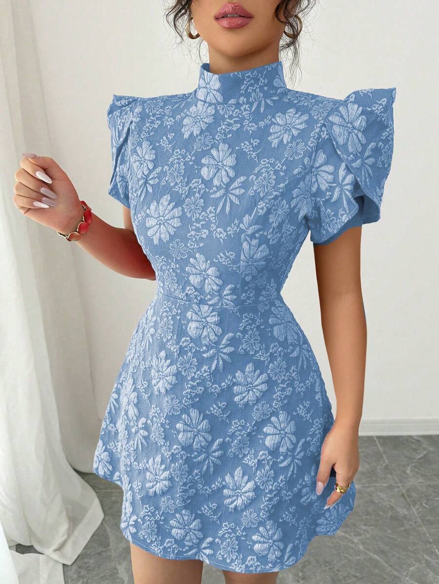 Step into summer with this playful vintage-inspired green mini dress. Featuring charming puff sleeves and a high neck, it balances sweet with sophistication. The backless design adds a flirty twist, perfect for sunny days and warm nights. Light, fun, and effortlessly stylish—this dress invites you to twirl, dance, and shine wherever you go.