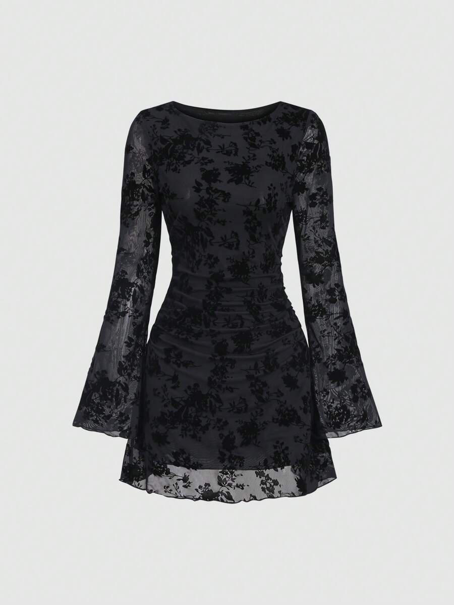 Step into timeless charm with this Elegant Vintage Mesh Flocked Long Sleeve Fitted Mini Dress. Its delicate mesh and flocked details add a touch of whimsy, while the fitted silhouette flatters your curves perfectly. Long sleeves keep it classy, and the mini length brings a flirty edge—ideal for turning heads at any event. Dress up your playful side with vintage-inspired elegance!