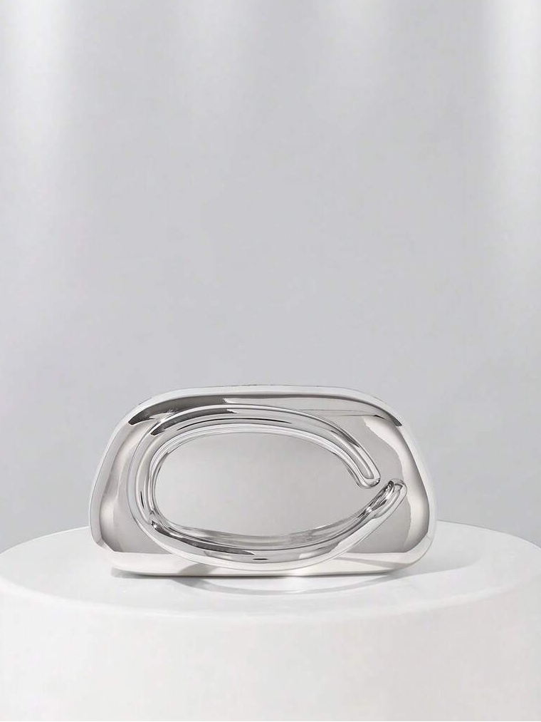 This exquisite vintage metal clutch is the ultimate accessory for your most memorable moments. Featuring an ornate decorative box design with a polished metal frame, it exudes timeless sophistication. The compact silhouette fits seamlessly into formal occasions-from weddings to evening galas—while the secure clasp keeps your essentials safe. Rich detailing and refined craftsmanship make this purse a standout piece that complements any elegant ensemble. A must-have for women who appreciate vintage charm 