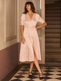 Step into autumn elegance with this charming vintage-inspired midi dress that effortlessly blends sophistication with whimsy. Crafted in luxurious pink satin, it features delicate floral detailing and a polished button front that adds just the right touch of business-casual flair. The midi length offers timeless appeal while the soft, flowing fabric drapes beautifully for all-day comfort. Perfect for transitioning from office to evening plans, this dress proves that vintage charm never goes out of style.