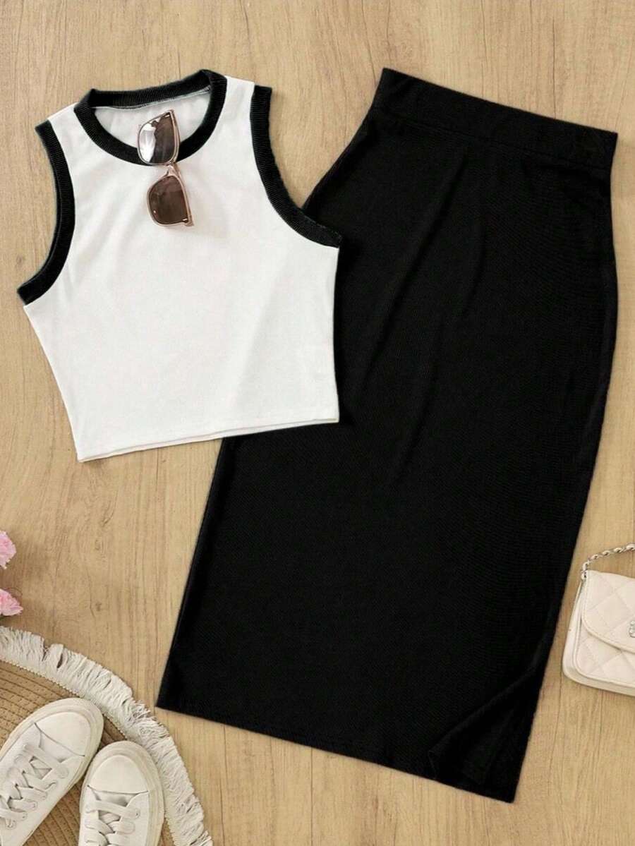 Elevate your wardrobe with this stunning 2-piece vintage resort set. The elegant camisole features a classic round neckline with contrast binding, paired with a flowing maxi skirt for effortless sophistication. Crafted from quality polyester with slight stretch for comfort, this versatile ensemble transitions seamlessly from garden gatherings to office settings and evening outings. The slim-fit silhouette flatters your figure while the timeless white and black colorway complements any occasion. 