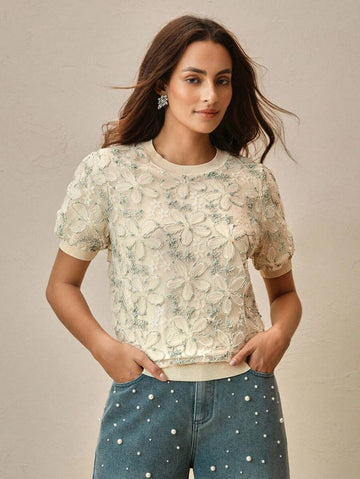 Slip into effortless sophistication with this charming vintage-inspired tee. The delicate sheer fabric in a gorgeous green hue brings an airy, romantic touch to your everyday wardrobe, while the thoughtfully designed cut flatters your silhouette beautifully. Perfect for layering or wearing solo, this short-sleeve essential bridges the gap between timeless elegance and modern comfort. Whether you're dressing up for brunch or keeping it casual, this piece adds that perfect dash of vintage charm to any outfit.