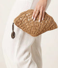 Add a touch of vintage charm to any evening with this Elegant Vintage Textured Shell Bag. Its unique 3D woven design offers both style and texture, making it a conversation starter at parties or formal events. Compact yet spacious enough to hold essentials, this playful handbag brings timeless elegance with a modern twist to your special night out.