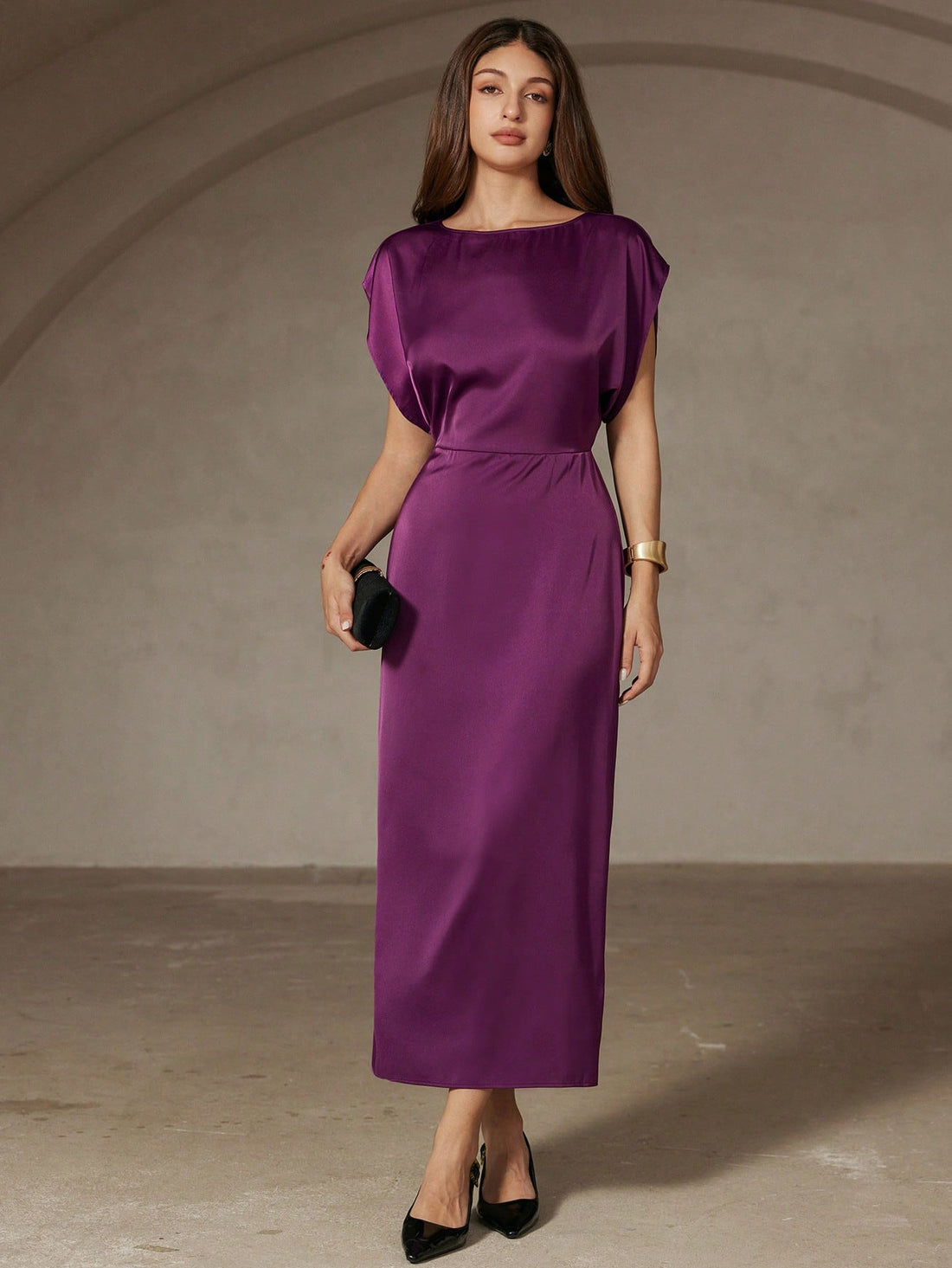 Slip into sophistication with this stunning long dress that knows how to make an entrance. The luxurious satin-like fabric drapes beautifully while the cinched waist creates an enviable silhouette that flatters every frame. A playful chain detail adds just the right amount of edge to keep things interesting. Perfect for date nights, celebrations, or whenever you want to feel absolutely fabulous. This is the dress that makes you feel like the best version of yourself.
