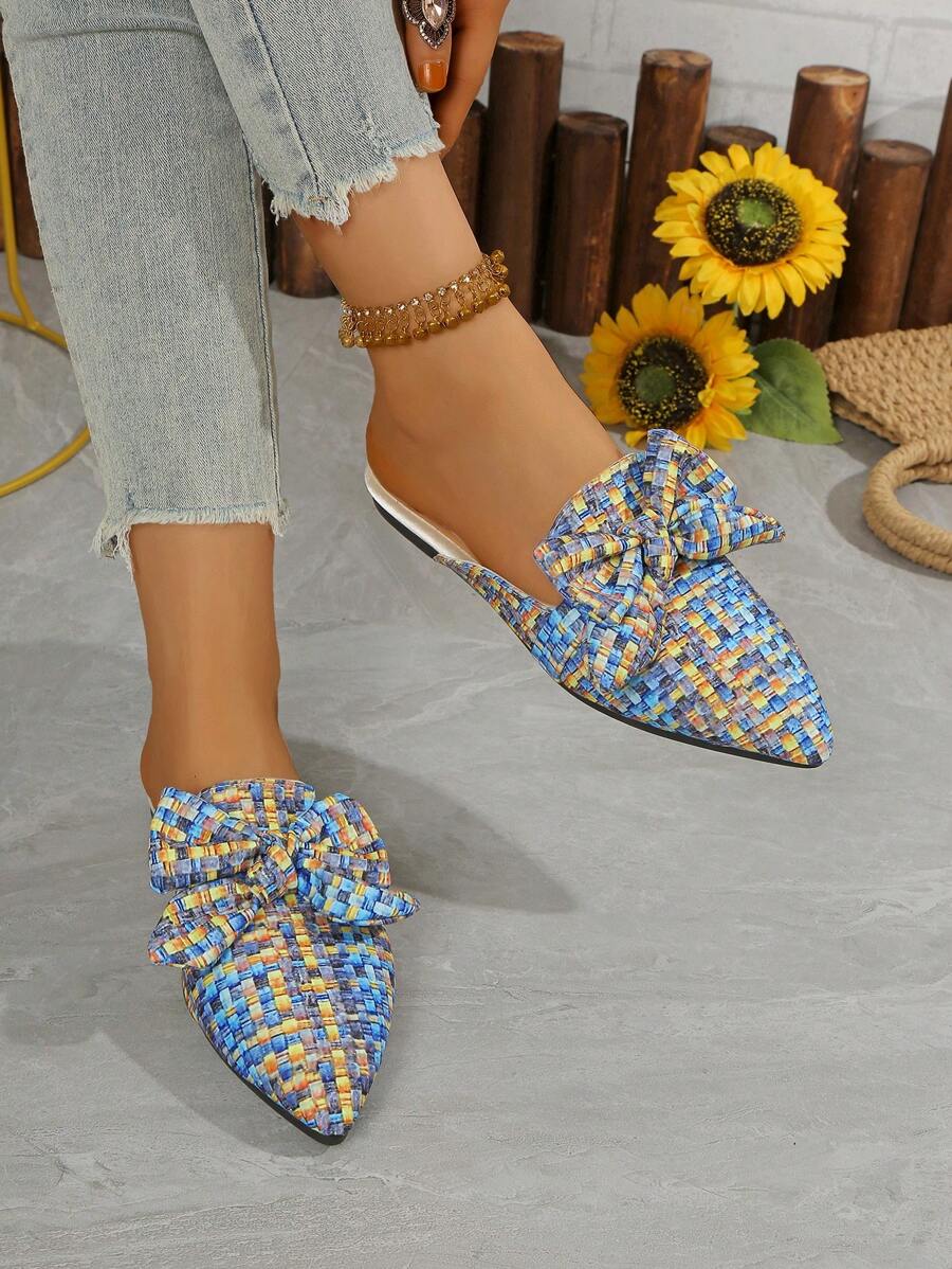 Step into style and comfort with our Elegant White Bow Flat Mules. The elastic band provides a snug fit while the bow adds a touch of elegance. Versatile for both spring and autumn, these mules are the perfect addition to your wardrobe. (Your feet will thank you!)