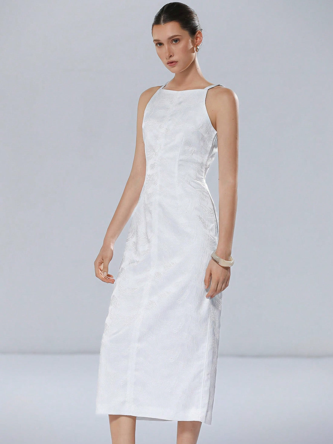 Step into the spotlight with this Elegant White Feather Jacquard Satin Dress, crafted to make every romantic wedding season unforgettable. Its delicate feather pattern and smooth satin fabric dance together to create a look that’s both graceful and playful. Perfect for twirling on the dance floor or stealing glances down the aisle, this dress combines sophistication with a touch of whimsy for your special day.