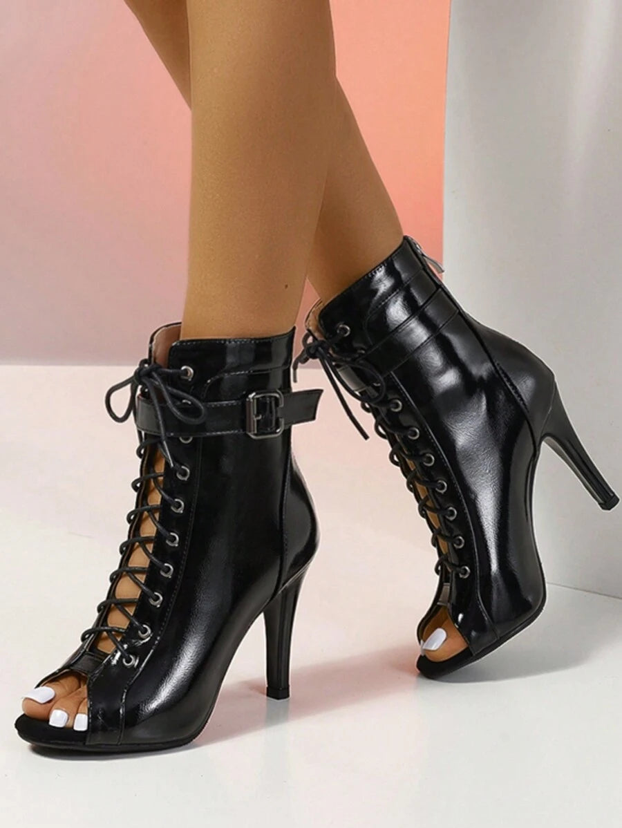 Step into the spotlight with these Elegant White High Heel Dance Boots! Featuring a chic pointed toe and a playful lace-up design paired with a convenient zipper, they combine style and ease. The high heel adds graceful height, perfect for turning heads on the dance floor or any special occasion. Dance your way with confidence and flair in boots that blend elegance with a fun twist.