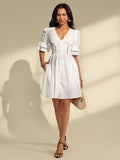 Twirl into summer with this stunning white lace mini dress that's equal parts romantic and chic. The delicate lace fabric creates an effortlessly elegant look, while the waist-cinching detail flatters your silhouette and adds a touch of sophistication. Perfect for garden parties, brunch dates, or any occasion where you want to feel absolutely fabulous. This versatile piece transitions seamlessly from day to night, making it a wardrobe essential for the season ahead.