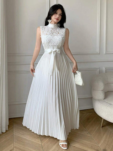 Styled view of lace bodice pleated maxi dress showing visible color, print, and silhouette