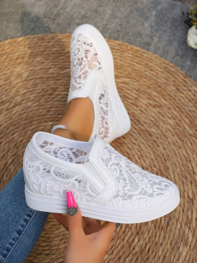 Take your sneaker game to the next level with our Elegant White Lace Wedge Sneakers. Designed with breathable materials to keep your feet cool and comfortable, these fashion-forward sneakers feature a subtle wedge for added height and style. Elevate any outfit and step up your fashion game with these must-have sneakers.