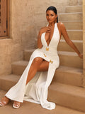 Make a statement in this stunning white maxi dress that effortlessly blends sophistication with fun. The plunging V-neckline and dramatic high slit create an alluring silhouette, while delicate butterfly embellishments add whimsical charm. Whether you're lounging at a resort or dancing through an evening celebration, this dress delivers head-turning elegance with a playful twist. Versatile enough for any occasion, it's the perfect piece for anyone who loves to feel confident and fabulous.