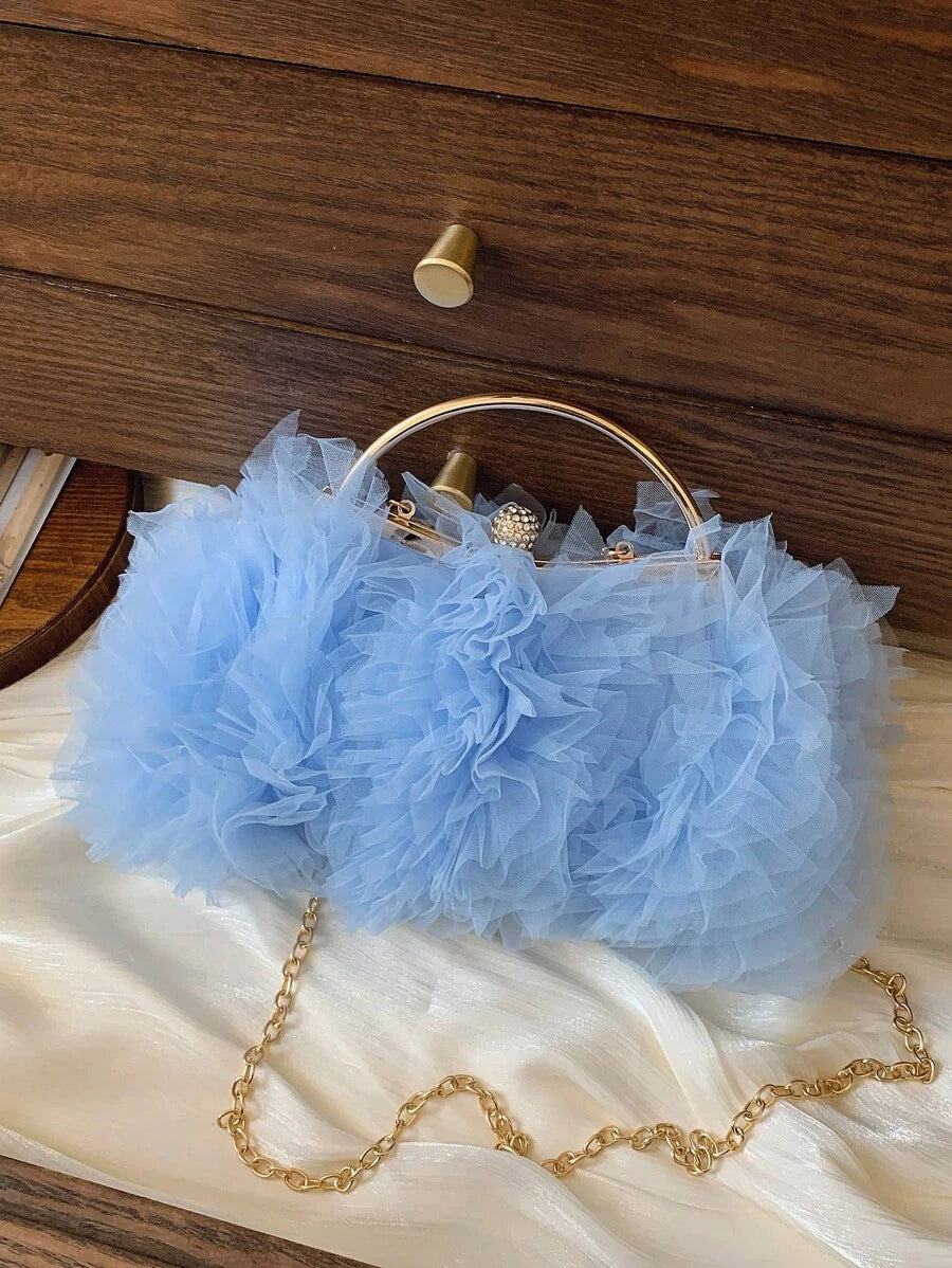 Add a touch of sparkle to your special day with this Elegant White Mesh Ruffle Handbag. Featuring delicate ruffles and shimmering rhinestone accents, it’s the perfect playful accessory to carry your essentials at weddings and celebrations. Light, stylish, and sure to turn heads!