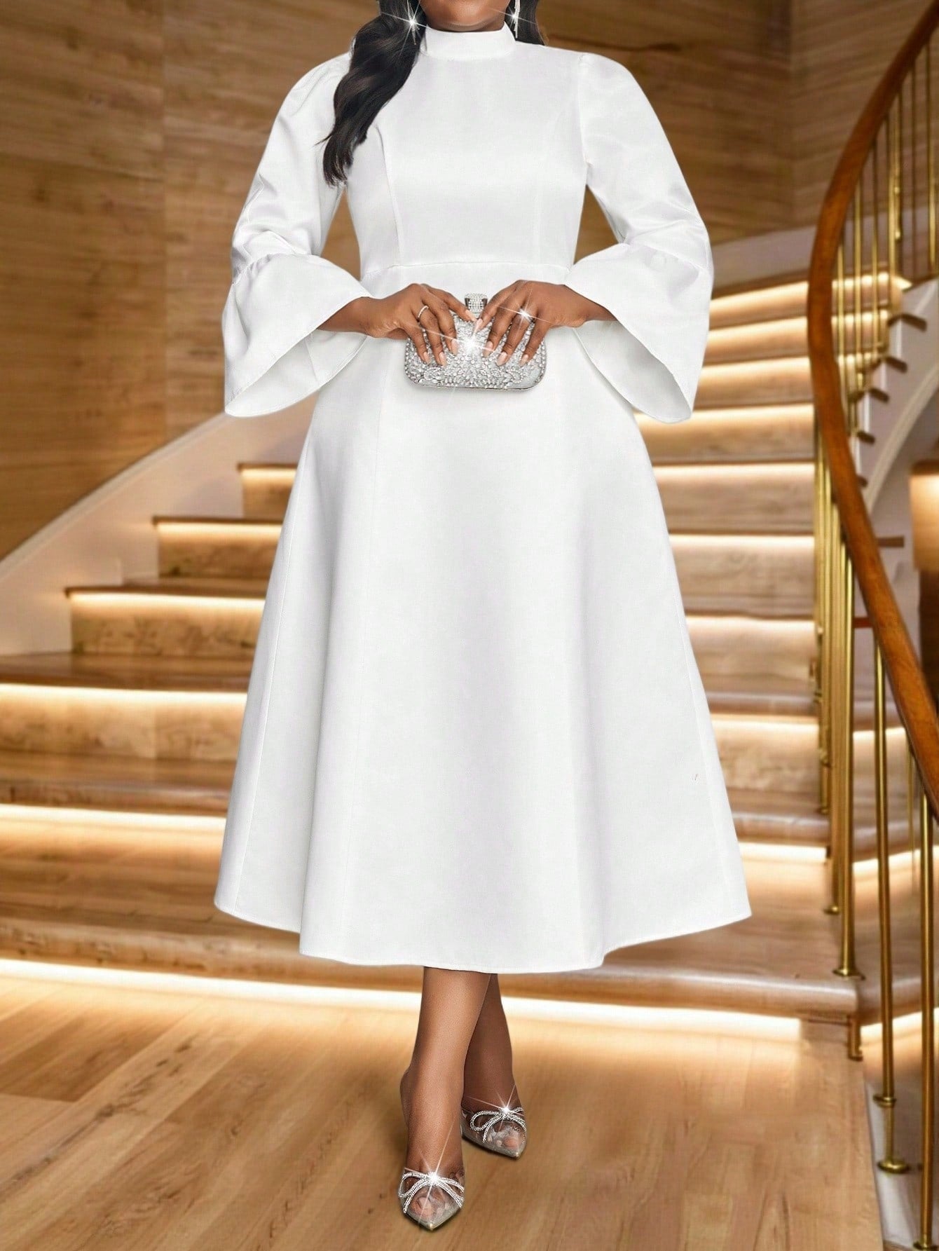 Elevate your wardrobe with this stunning white satin A-line dress that effortlessly transitions from boardroom to brunch. The graceful bishop sleeves add a touch of romance, while the midi length keeps things polished and sophisticated. Designed with plus-size comfort in mind, this versatile tunic flatters every figure and works beautifully for office meetings, weekend outings, or summer gatherings. Slip it on and feel the confidence that comes with looking absolutely fabulous.
