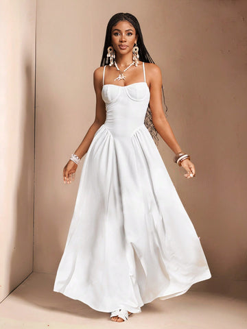 Get ready to slay this wedding season with our Elegant White Spaghetti Strap Dress! This stunning dress is perfect for spring and summer weddings, designed by Slaydiva for women who want to look stylish and chic. The long, flowy silhouette and delicate spaghetti straps will have you feeling like a true diva.