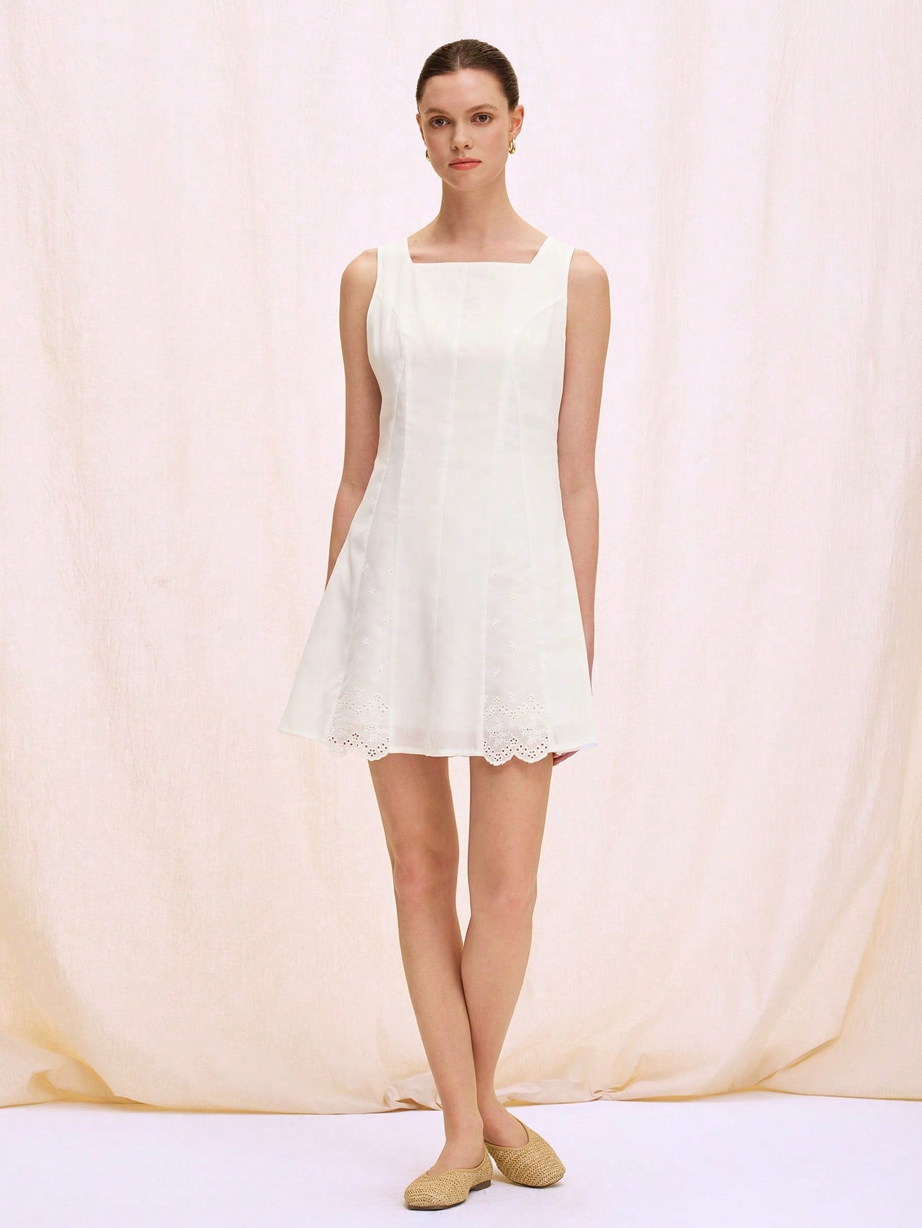 Step into charm with this Elegant White Dress featuring a flirty square neckline and delicate lace trim. Its sleeveless design keeps things breezy and fun, perfect for twirling through sunny days or sparkling at evening soirees. Embrace your feminine side with a dress that’s as playful as you are!
