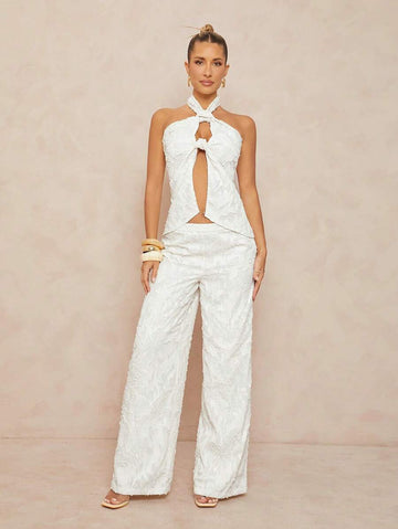 White textured halter cutout top and wide-leg pants set