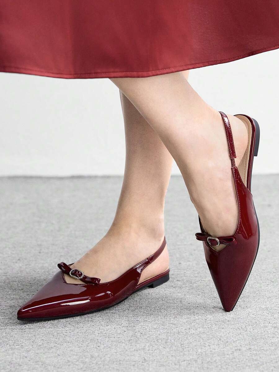 Elevate your footwear collection with these sophisticated wine red sandals, designed for seamless transitions from office to evening. The backless slip-on silhouette offers effortless comfort, while the sparkling rhinestone buckle detail adds a touch of refined glamour. Crafted as versatile flat shoes, they provide all-day wearability without compromising on style. Perfect for professional settings or special occasions, these sandals deliver polished elegance with every step.