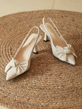 Elevate your special occasion style with these sophisticated wine red slingback pumps. Featuring a charming bow detail and pointed toe silhouette, these kitten heels offer the perfect balance of elegance and comfort. Crafted from premium PU leather with a soft microfiber lining, they're designed to feel as luxurious as they look. The slip-on slingback design ensures easy wear, while the mid-height heel provides all-day wearability for weddings, Valentine's celebrations, and beyond. True to size for a perfec