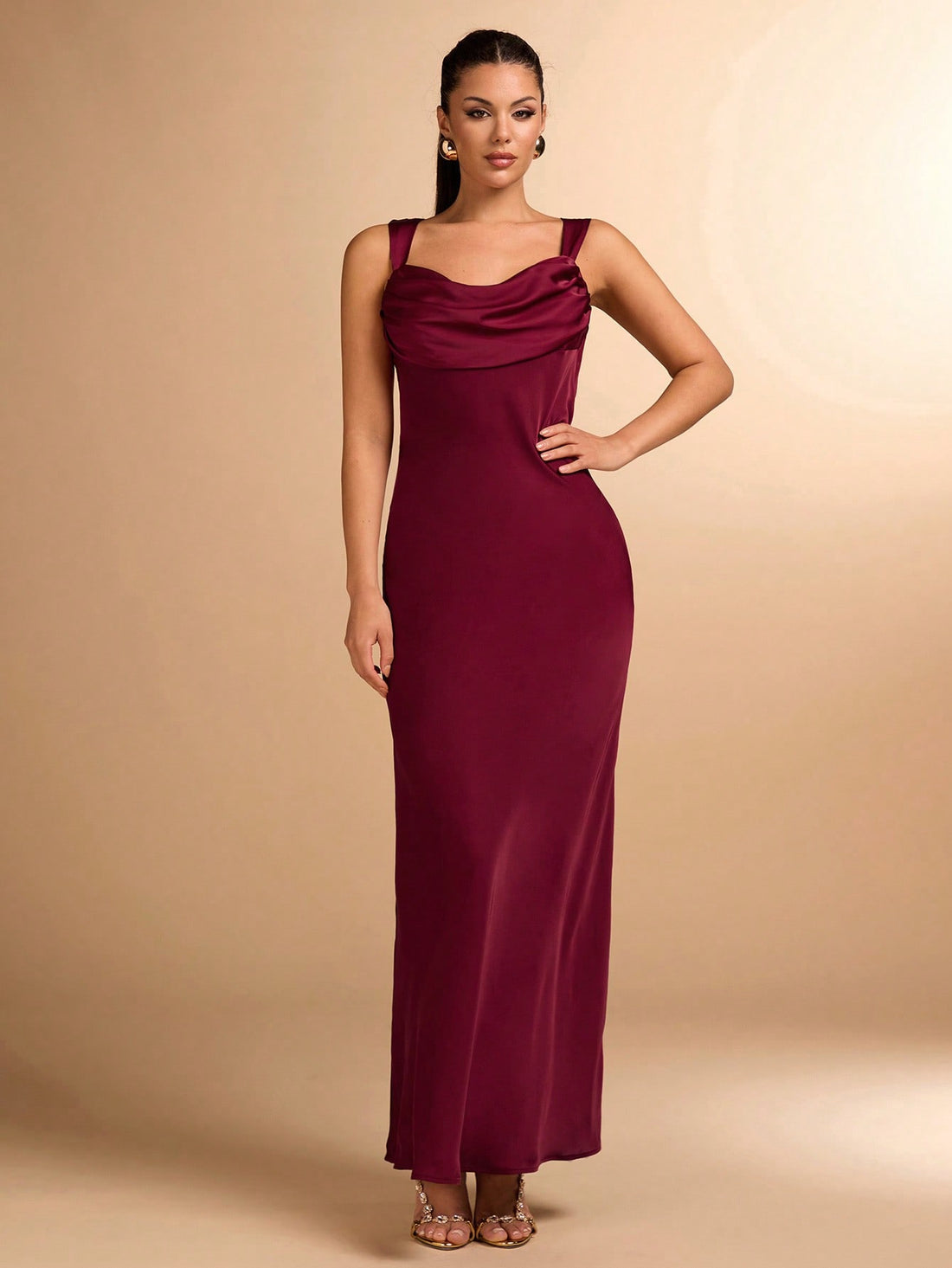 Unleash your allure with this elegant wine red satin dress. With a stunning backless design, this evening dress is perfect for making a statement and turning heads. Perfect for special occasions, this dress will have you feeling confident and stylish all night long.