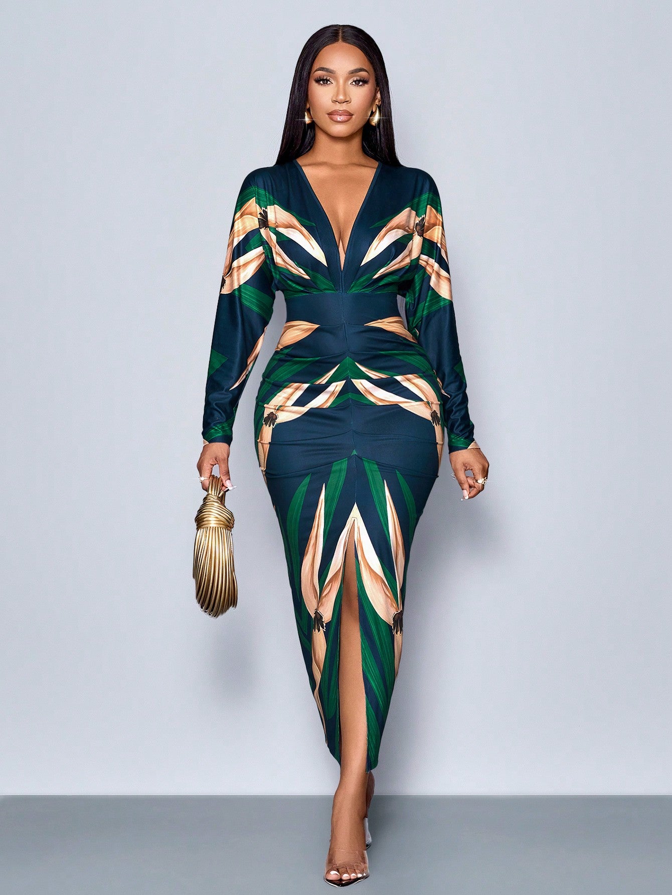 Step into the spotlight this holiday season with our Elegant Winter V-Neck Bodycon Dress. Featuring a sultry split thigh design, this dress is perfect for rocking the dance floor at any holiday party. Embrace your inner fashionista and turn heads in this must-have dress.