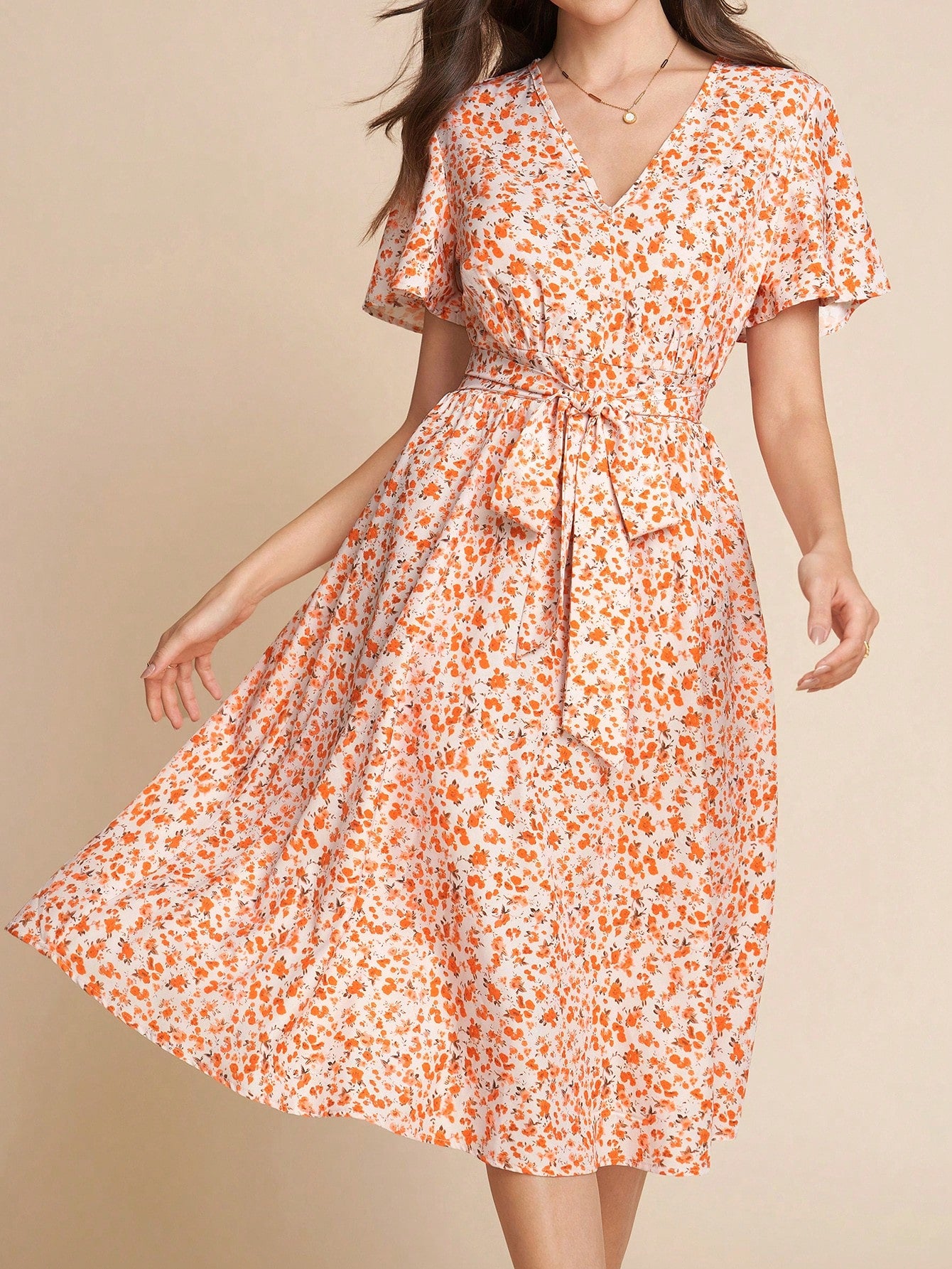 This A-line dress features lotus leaf sleeves, perfect for your summer vacations and daily travels. Stay stylish and comfortable in this elegant dress, designed for the modern woman on the go.