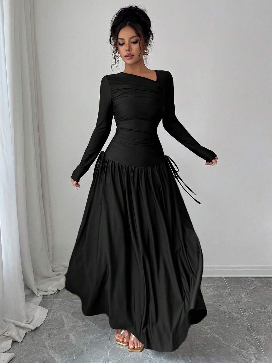 Step into the changing seasons with a silhouette that defines sophisticated charm. This stunning A-line masterpiece is designed for the woman who appreciates architectural details and a refined, feminine aesthetic—perfect for transitioning from a breezy spring morning to a crisp fall evening.