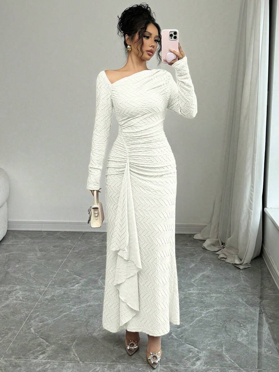 Turn heads on your commute with this stunning asymmetric collar maxi dress that effortlessly blends sophistication with modern edge. The bodycon silhouette hugs your curves in all the right places, while the cinched waist creates a flattering hourglass shape. Perfect for fall transitions, this dress moves from office to evening with ease. The unique asymmetric neckline adds an unexpected twist that sets you apart from the crowd. Slip it on and feel the confidence that comes with looking absolutely fabulous.