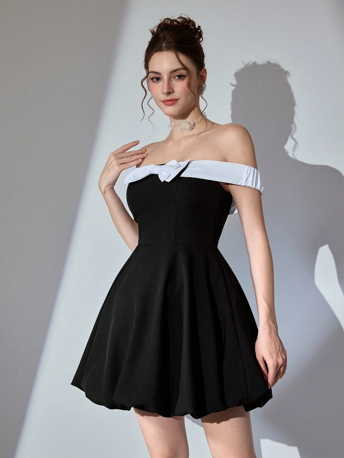 Elevate your wardrobe with this stunning cocktail dress that effortlessly transitions from brunch to evening soirée. Crafted with refined elegance, this piece features a flattering silhouette that works beautifully for weddings, parties, and those moments when you want to feel absolutely fabulous in everyday life. The versatile design pairs seamlessly with heels for a night out or flats for casual sophistication. Whether you're celebrating a special occasion or simply treating yourself to something special,