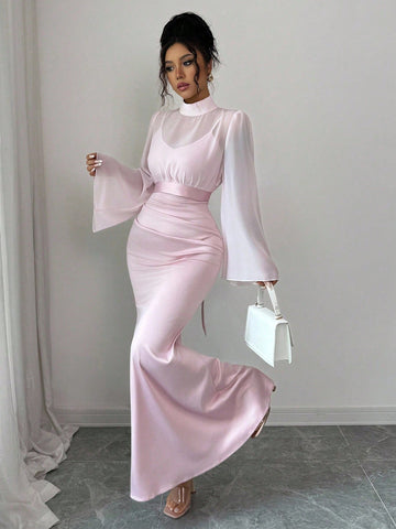 Step into autumn with effortless charm in this delightful two-piece set. The fitted camisole dress pairs perfectly with a sheer mesh shawl, creating a vintage-inspired silhouette that's equal parts cozy and chic. Whether you're layering for cooler days or draping the shawl for an instant style upgrade, this versatile ensemble captures that nostalgic retro vibe while keeping things refreshingly modern. Perfect for casual outings, weekend adventures, or whenever you want to feel put-together without trying to