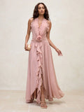 Step into summer with this playful chiffon maxi dress featuring a flirty ruffle halter neck and delicate 3D flower details. Its lightweight fabric flows effortlessly, making it the perfect companion for sunny vacations and breezy beach days. Embrace elegance and fun in one stunning outfit!