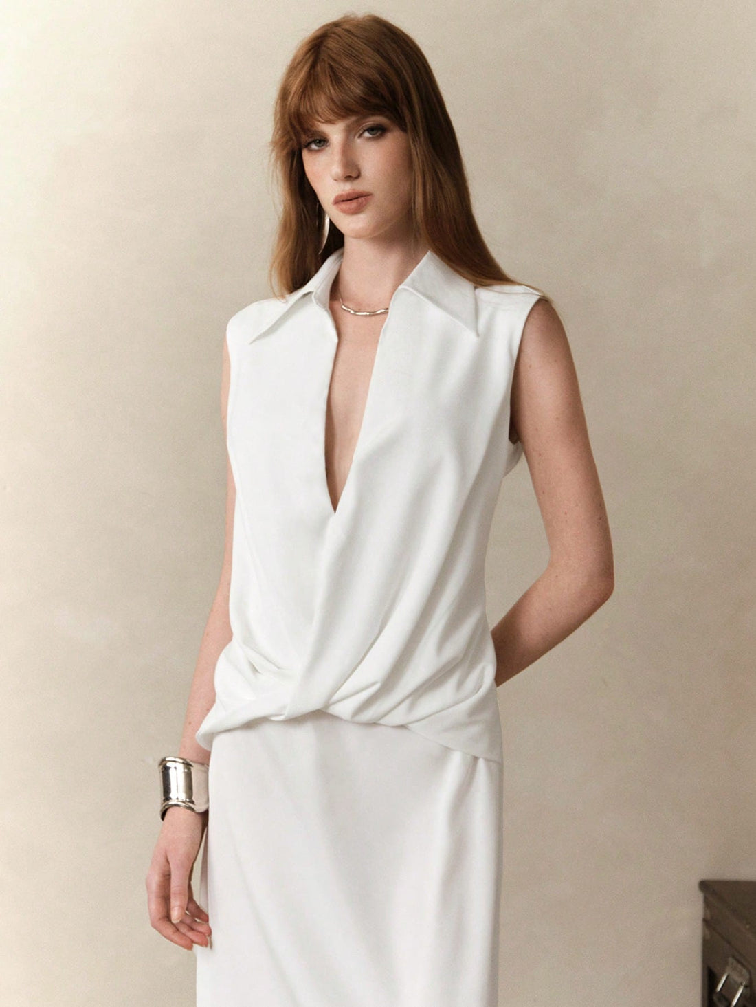 Step into style with this Elegant Women's Deep V-Neck Twist Detail Sleeveless Dress. Perfect for the office or back-to-school days, its flattering twist detail and sleek sleeveless design keep you cool and confident. Dress it up or down for a playful yet polished look that turns heads wherever you go!