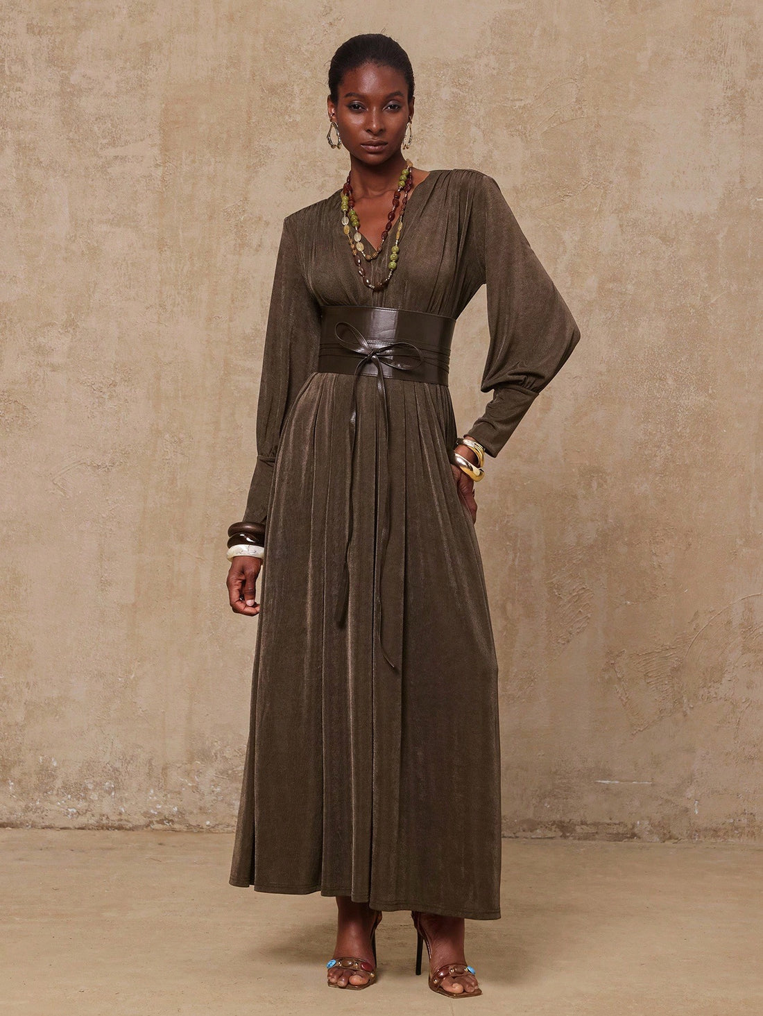 Step out in style this fall and winter with our Elegant Women's French Style Bodycon Maxi Dress. Featuring long sleeves and a daring deep V-neck, this dress hugs your curves for a flattering silhouette. Perfect for cozy evenings and festive events, it blends timeless French chic with modern sophistication. Get ready to turn heads and feel fabulous no matter the season!