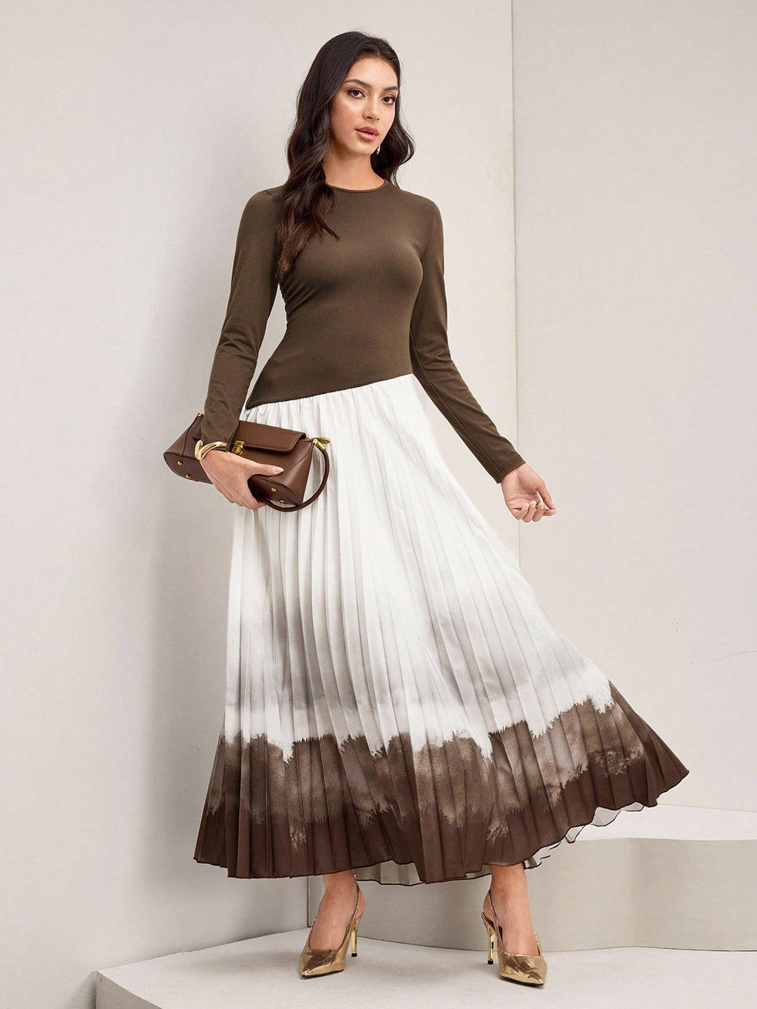 Elevate your wardrobe with this stunning gradient pleated hem dress that effortlessly blends timeless elegance with modern flair. Featuring flowing long sleeves and an authentic Arabic-inspired silhouette, this piece celebrates cultural sophistication while keeping you comfortable and chic. The mesmerizing gradient coloring adds depth and visual interest, while the delicate pleated hem creates graceful movement with every step. Perfect for special occasions, celebrations, or whenever you want to feel absolu