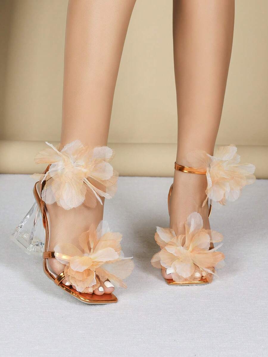 Step into charm with these Elegant Women's High Heels featuring criss-cross metal PU leather straps adorned with delightful 3D leaf and flower designs. Perfect for adding a playful touch to any outfit, these sandals combine style and comfort for your confident stride.