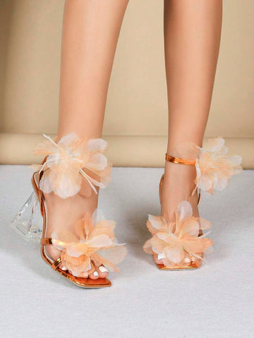 Step into charm with these Elegant Women's High Heels featuring criss-cross metal PU leather straps adorned with delightful 3D leaf and flower designs. Perfect for adding a playful touch to any outfit, these sandals combine style and comfort for your confident stride.